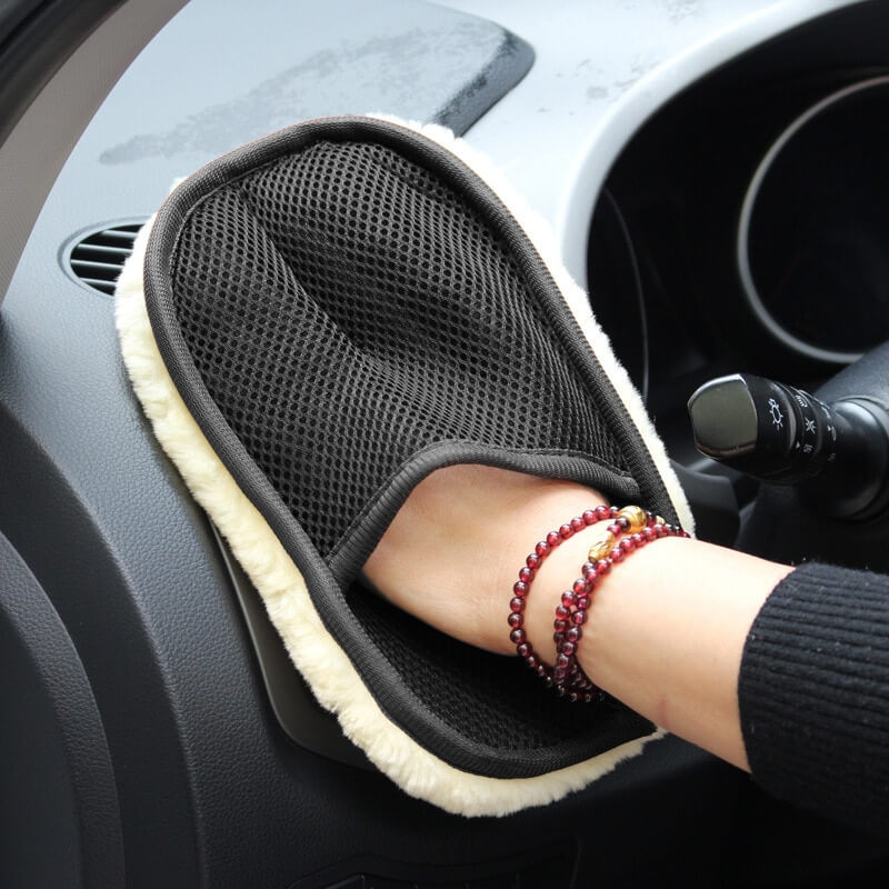 Car Washing Glove on hand cleaning inside of vehicle